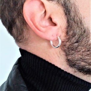 Bold 925 Sterling Silver earrings for men, 18mm diameter, 3mm caliber. Striking and attention-grabbing design.