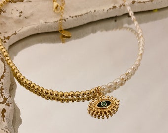 Half Pearl and Gold Necklace with Eye Charm