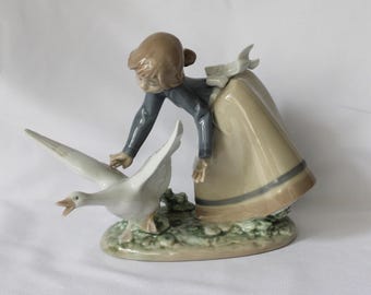 Retired Lladro Porcelain Figurine: “Wild Goose Chase” - Girl with Goose, Spain