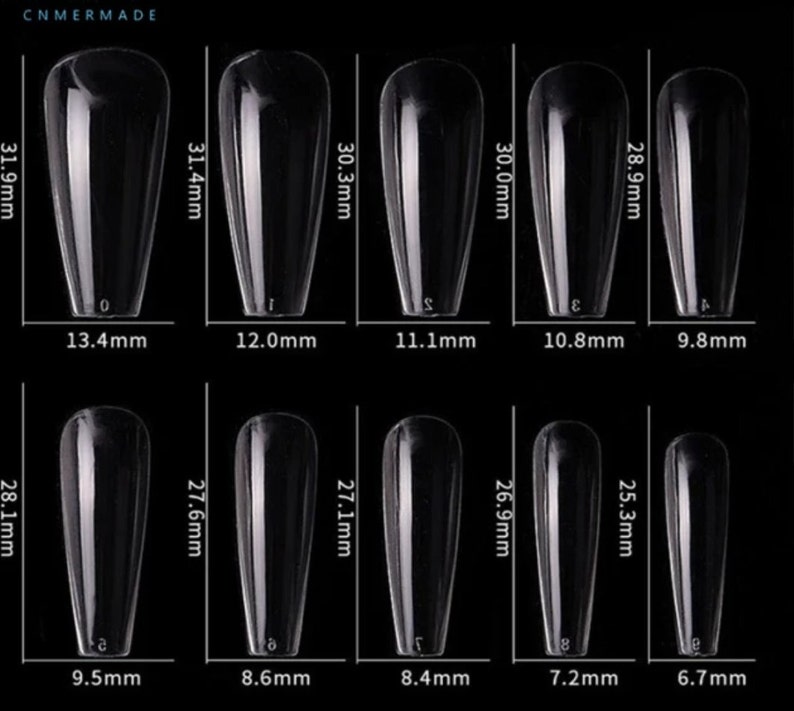 May include: Ten clear plastic nail tips in various sizes, ranging from 6.7 mm to 13.4 mm in width and 25.3 mm to 31.9 mm in length. The nail tips are arranged in two rows of five, with the measurements labeled below each tip.