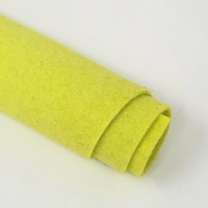 May include: A roll of bright yellow felt fabric. The felt is soft and has a slightly textured surface.