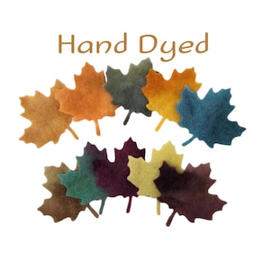 May include: Hand-dyed felt maple leaves in various autumn colors, including yellow, orange, red, brown, and green.  Hand Dyed.