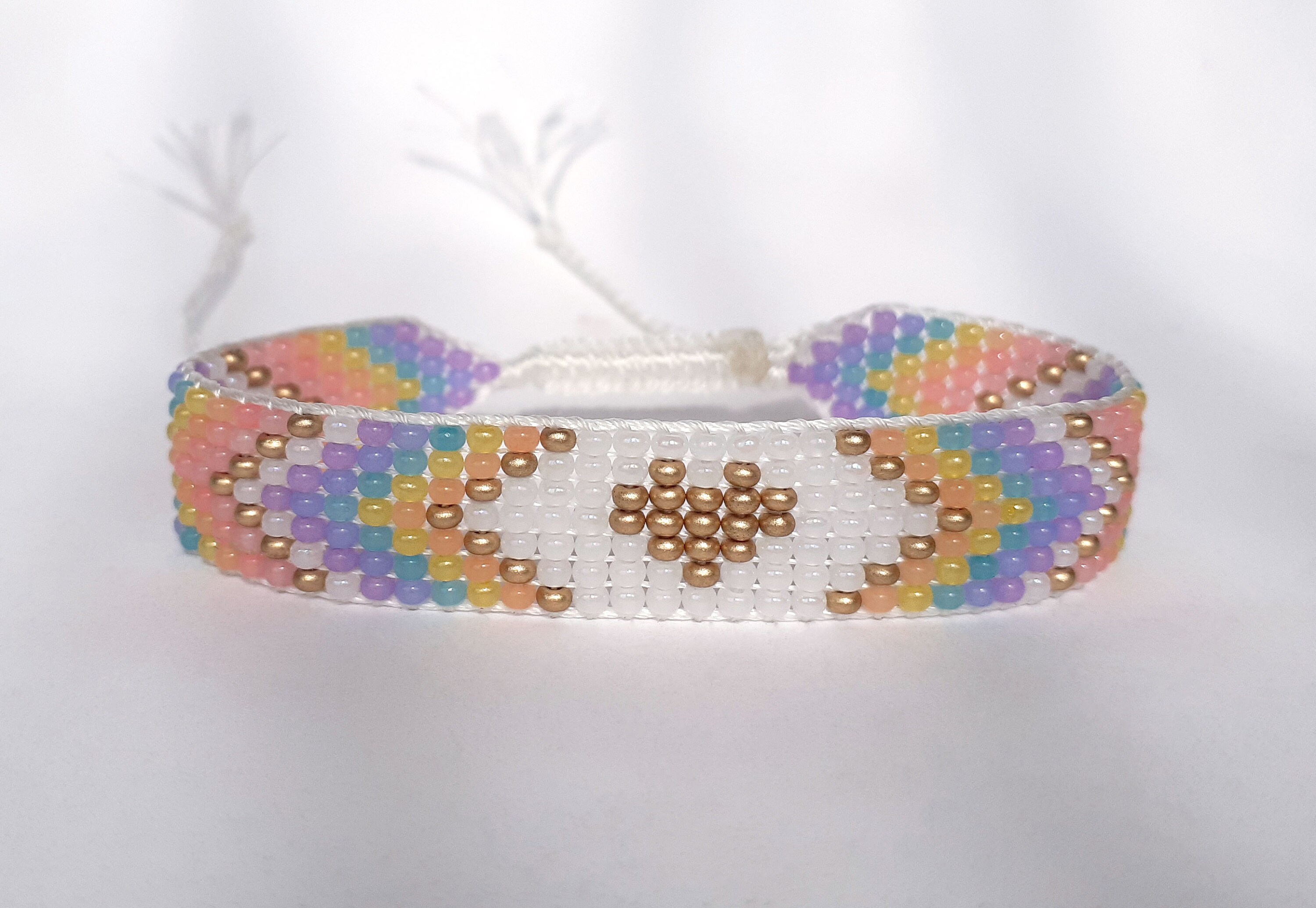 Pastel rainbow bracelet with gold heart Beaded hand woven | Etsy