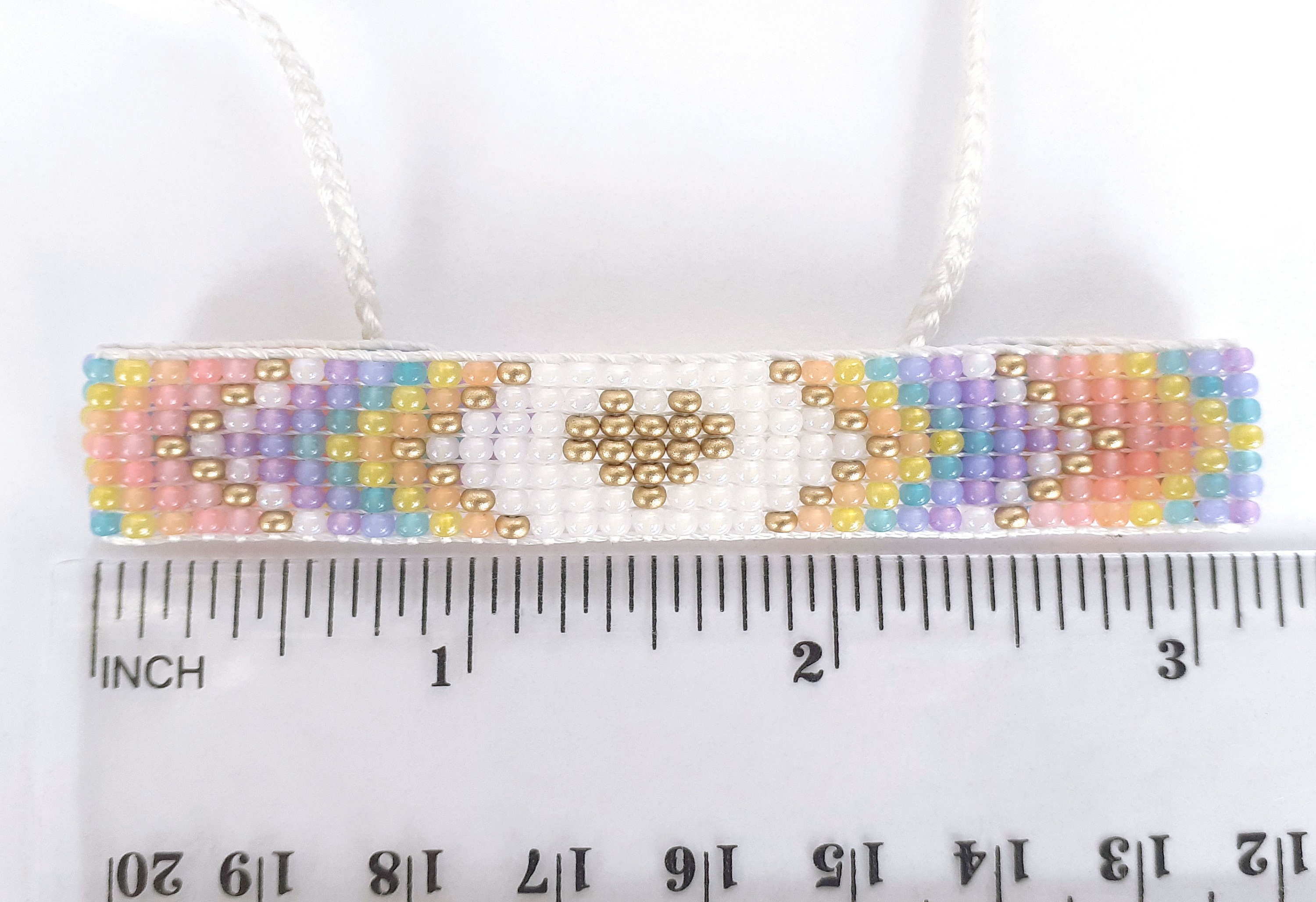 Pastel rainbow bracelet with gold heart Beaded hand woven | Etsy