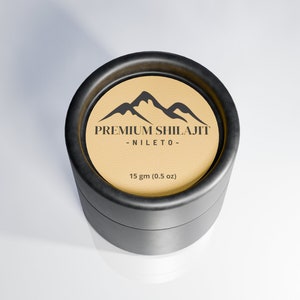 May include: A black cylindrical container with a brown label that reads "PREMIUM SHILAJIT - NILETO - 15 gm (0.5 oz)". The label also features a stylized mountain range graphic.