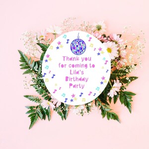 May include: Round white thank you sticker with a colorful disco ball, musical notes, and stars. The text reads "Thank you for coming to Lila's Birthday Party".