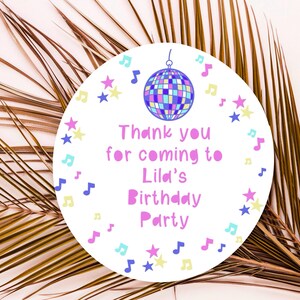 May include: Round white thank you sticker with a pink disco ball, stars, and musical notes. The text reads "Thank you for coming to Lila's Birthday Party".