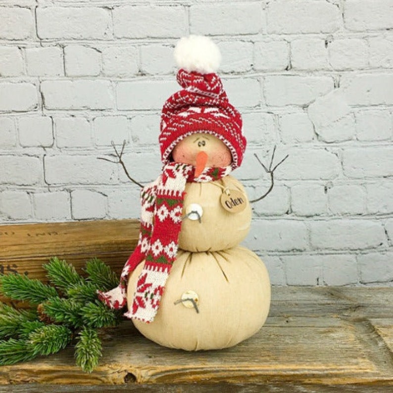 Oden The Snowman Winter Doll: Cozy Plush Sculpture, 11" Tall | Seasonal Mantle Decor, Soft Fabric, Festive Accent immagine 1