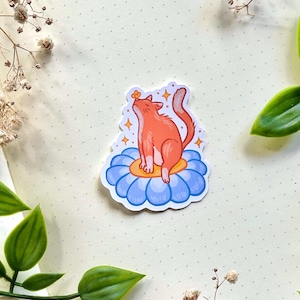 Autocollant chat mignon en vinyle mat - Motif chat orange sur fleur bleue 5 cm