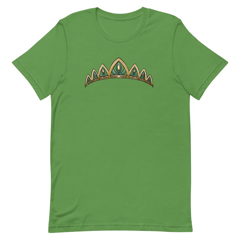 May include: A green t-shirt with a gold and green crown design.