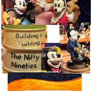 May include: A collection of vintage Mickey Mouse figurines, some with chipped paint, featuring Mickey in various poses, including playing football, wearing a Santa hat, and holding a bag of gifts. The figurines are displayed on a wooden shelf with a label that reads "Building a Building" and "The Nifty Nineties".
