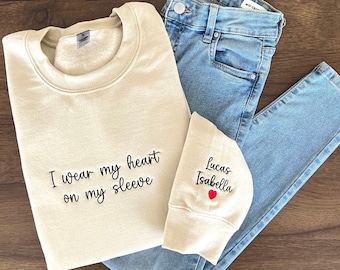 I Wear My Heart On My Sleeve, Embroidered Custom Mama Shirt With Kids Names, Pregnancy Reveal Hoodie Gift For New Mom, Mother's Day Gift