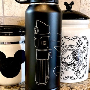 32oz Star Wars Lightsaber Water Bottles. These are laser engraved  with your favorite Jedi Lightsaber and signature like Darth Vader, Luke Skywalker, Obi-Wan Kenobi, Kylo Ren, Ahsoka Tano, and more! These can also be personalized.