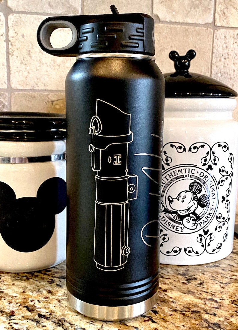 32oz Star Wars Lightsaber Water Bottles. These are laser engraved  with your favorite Jedi Lightsaber and signature like Darth Vader, Luke Skywalker, Obi-Wan Kenobi, Kylo Ren, Ahsoka Tano, and more! These can also be personalized.