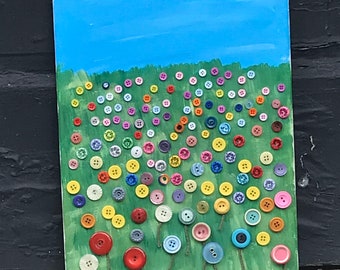 Field of flowers button collage on stretched canvas