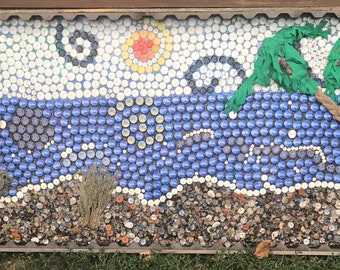 Large, unique beach mosaic made with buttons, beads and bottle caps. Custom frame.