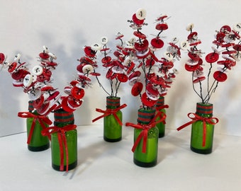 Tiny Christmas button flower bouquets/place setting name holders in green apothecary bottle