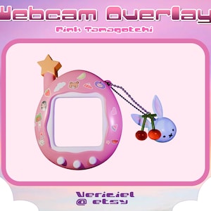 May include: Pink Tamagotchi-style webcam overlay with a cartoon bunny charm and cherries. The overlay has a white screen and pink buttons. The text "Verieiel @ etsy" is at the bottom.