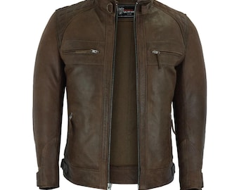 May include: Brown leather jacket with a stand-up collar, zipper closure, and multiple pockets. The jacket has quilted shoulder detailing and a classic biker style. The leather appears distressed, giving it a vintage look.
