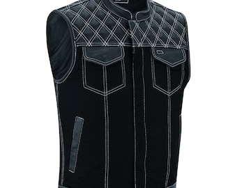 May include: Black leather motorcycle vest with a diamond quilted pattern and white stitching. The vest has a stand-up collar, two front pockets, and a zipper closure.