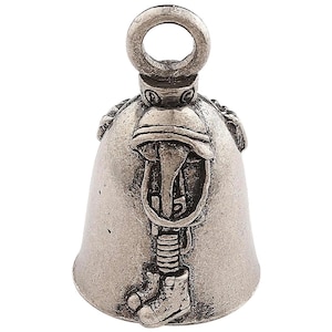 May include: Silver motorcycle bell with a detailed design of a soldier in a helmet, boots, and a rifle.
