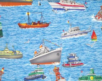 May include: A nautical-themed fabric featuring various boats and ships on a blue ocean background. The image includes sailboats, tugboats, and cruise ships, along with buoys and seagulls. The boats are in shades of red, white, green, and gray.