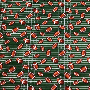 Footballs on Grid Iron Cotton fabric - 1/2 Yard