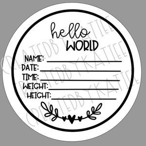 May include: A circular white sign with a black border, featuring the words "hello WORLD" in a handwritten style. It includes lines for Name, Date, Time, Weight, and Height, and a floral and heart design.