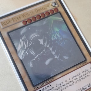 Dragon blanc aux yeux bleus - GLD5-EN001 - Ghost Rare Limited Edition ~ > Monstre hors cadre ! <