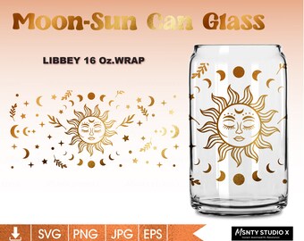 May include: A gold sun and moon design on a clear glass can. The can is 16 ounces and is labeled "Libbey 16 Oz. Wrap".