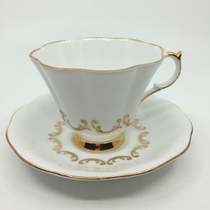 Queen Anne Gold and White Teacup