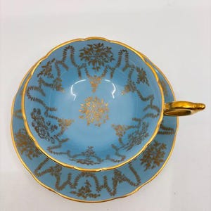 Stunning Coalport Blue and Gold Teacup and Saucer 10148