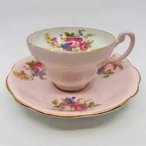 EB Foley rare mid century pink teacup with floral motif.