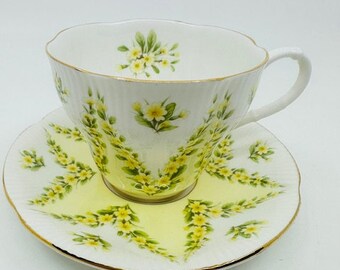 Tasse à thé et soucoupe en satin jaune Royal Albert