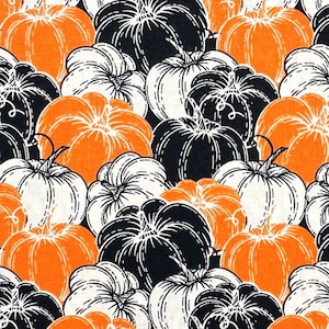 Halloween fabric -- Orange, black, and white pumpkins repeated -- 100% cotton quilting fabric