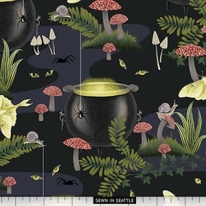 Halloween fabric -- Witchy forest scene with black cauldrons, cat eyes, luna moths, and mushrooms -- 100% quilting cotton fabric by the yard