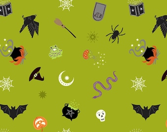 Halloween fabric -- Witchy items on acid green with metallic silver highlights -- Cauldrons, bats, skulls -- 100% cotton quilting fabric