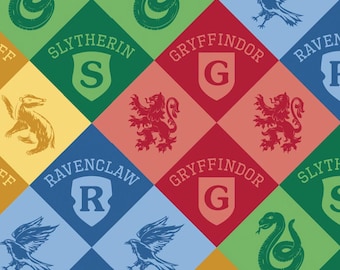 HARRY POTTER fabric -- Hogwarts House crests and colors in diamond pattern -- 100% cotton quilting fabric