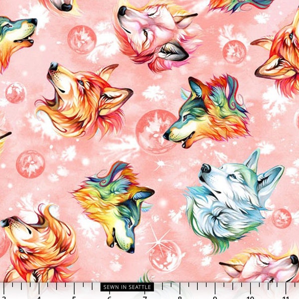 Colorful wolf heads tossed on a pink galaxy background -- 100% cotton quilting fabric