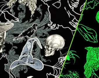Halloween fabric -- Glow-in-the-dark spooky Halloween items on black cotton -- 100% cotton quilting fabric