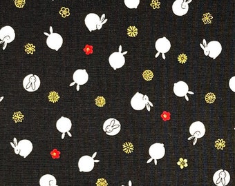 Japanese fabric -- Small bunnies and mini red and metallic gold flowers repeated on black -- 100% cotton quilting fabric
