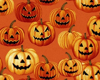 Halloween fabric -- Jack-o'-lanterns packed on orange -- 100% quilting cotton fabric by the yard