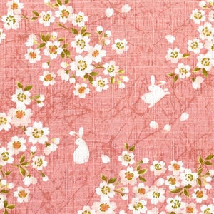 Japanese DOBBY fabric -- Rabbits hopping through cherry blossoms on pink textured cotton -- 100% cotton dobby fabric
