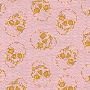 Halloween fabric -- Dark yellow skulls on pink -- 100% cotton quilting fabric