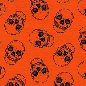 Halloween fabric -- Black skulls on orange -- 100% cotton quilting fabric