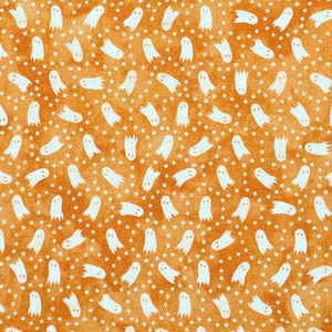 Halloween fabric -- Small ghosts and dots on mottled orange -- 100% cotton quilting fabric