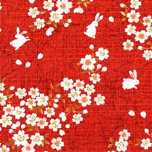 Japanese DOBBY fabric -- Rabbits hopping through cherry blossoms on red textured cotton -- 100% cotton dobby fabric