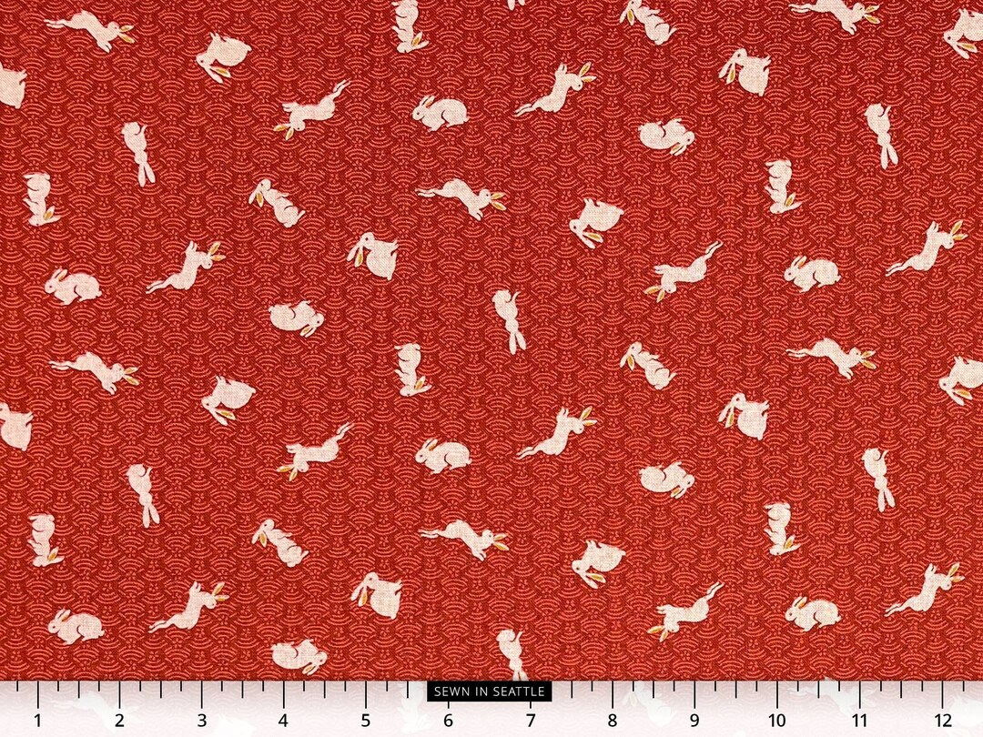 Japanese Fabric -- Natural Rabbits Hopping on a Patterned Red ...