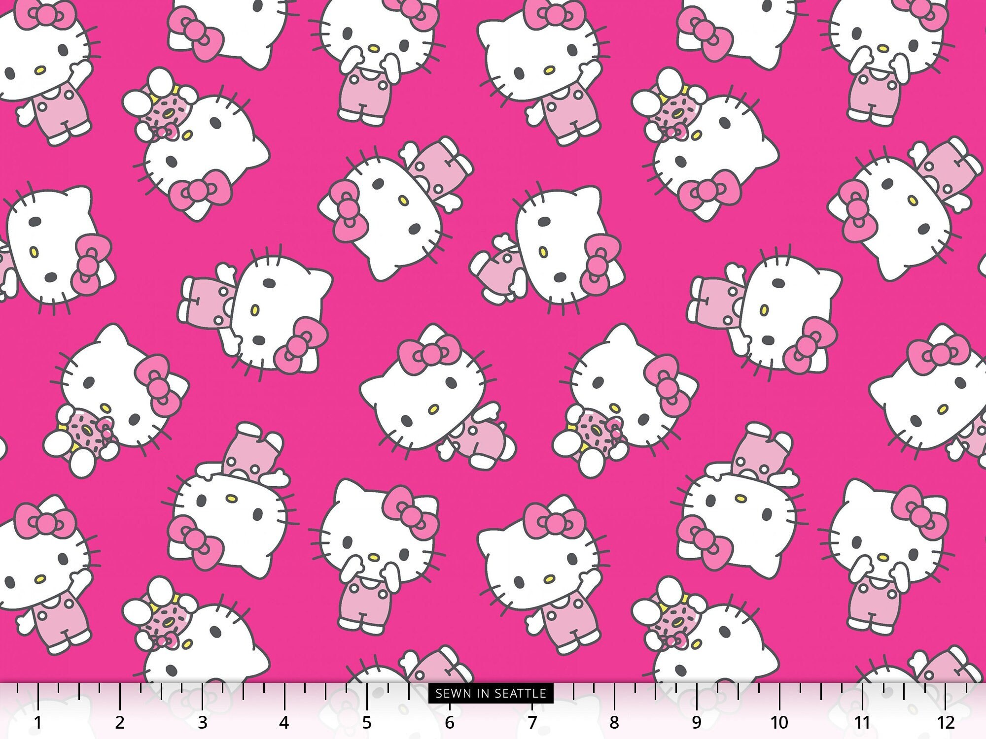 Hello Kitty fabric -- Hello Kitty, bows, and pink polka dots on red -- 100%  cotton quilting fabric