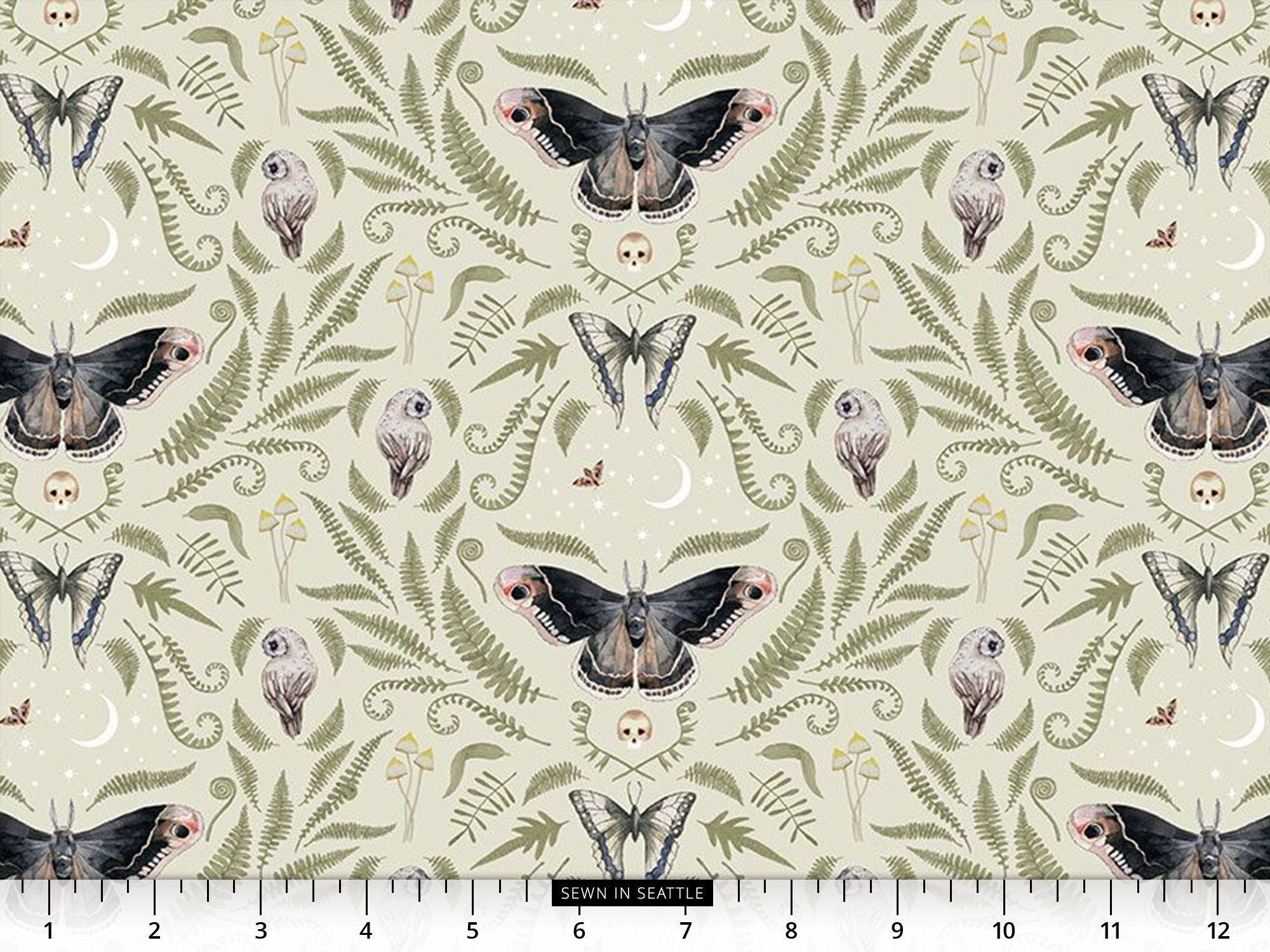 Moths, owls, mushrooms, and fern fronds repeated on light sage green -- 100% cotton quilting fabric